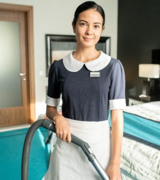beautiful-chambermaid-with-vacuum-cleaner-2021-09-24-03-43-56-utc-qcsg10mvarpyttsu6y7ngdim6rws5frjh6kbu18bg4